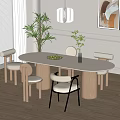 Modern Round Dining Table Set With White Tabletop Wooden Legs Four Chairs And Green Plants