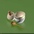 Essential Kitchen Utensils With Mortar Pestle Stacked Bowls And Wooden Spoon On Green Surface