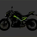 Sporty Black and Green Motorcycle with Sleek Body Design and Stylish Wheels