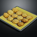 Delicious Butter Cookies on Yellow Square Plate with Decorative Edge and Black Background