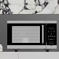 Electrolux Microwave Oven On Kitchen Shelf With Marble Countertop And Books