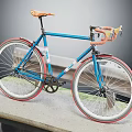 Blue Bicycle with Orange Seat Red Rims and Stylish Urban Design Features