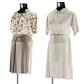 Clothes Hanger Displaying Floral Blouse Gray Skirt And Beige Dress With Waist Tie