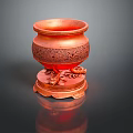 Red Decorative Vessel With Intricate Carved Patterns And Animal Shaped Feet On Base