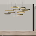 Multiple Modern Circular Chandeliers With Metallic Frames And Warm Lighting In Contemporary Design 3d model