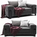 Modern Single Sofa in Gray and White with Striped Pillows Cozy Blankets and Metal Legs