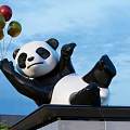 Artistic Panda Landscape Sculpture Holding Colorful Balloons Against Blue Sky