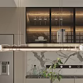 Sleek Modern Kitchen Pendant Light Hanging Over Marble Counter With Glass Cabinets