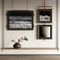 Abstract Paintings Framed On Wall With Ceramic Vase And Wooden Shelf