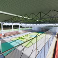 Indoor Basketball Gym Interior With Multiple Courts Red Seats And Metal Roof Structure