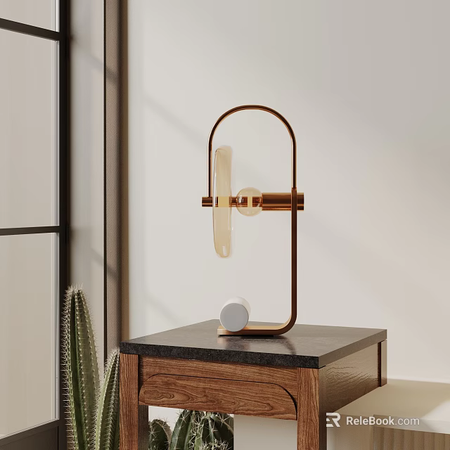 Stylish Table Lamp With Curved Gold Metal Frame And Transparent Glass Shade On Dark Surface 3d model 