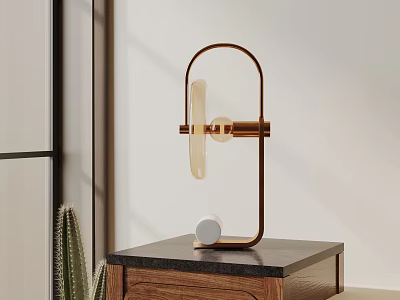 Stylish Table Lamp With Curved Gold Metal Frame And Transparent Glass Shade On Dark Surface 3d model