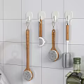 White Hooks Mounted On Tile Wall Holding Kitchen Utensils 3d model