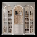 White Arched Display Cabinet With Glass Doors And Marble Background Decorative Items Books And Lighting