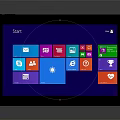 Portable Tablet With Black Frame Displaying Start Interface And Colorful App Icons On Blue Screen