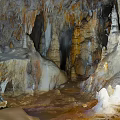 Underground Cave Scenery With Stalactites Stalagmites Natural Rock Formations Dripping Water And Rocky Walls