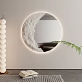 Circular Moon Textured Backlit Mirror with Floor Lamp Open Book and Green Plant