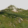 Natural Mountain Range With Green Grassy Slopes And White Rocky Peaks In Rolling Terrain