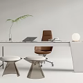 Modern Glass Desk Interior With Laptop Potted Plant White Round Lamp Brown Chair And Stools