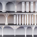 Modern White Perforated Columns With Varied Shapes Displayed on Shelves