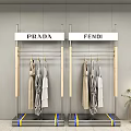 Prada And Fendi Fashion Store With Hanging Dresses On Modern Racks
