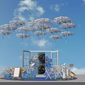 IndoSoul Event Setup With Hanging Purple White Umbrella Decorations And Blue Pink Floral Arrangements