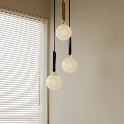 Modern Minimalist Pendant Lights With Three White Globe Shades Black Metal Rods And Gold Accents 3d model