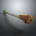 Ornate Decorative Weapon With White Staff Golden Accents And Green Gemstones