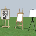 Art Painting Supplies With Wooden Easels And Blank Canvas On Grass Field