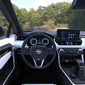 White Toyota SUV With Black Wheels And Front Design In Outdoor Grass Background