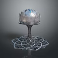 Artistic Decorative Sculpture With Transparent Glass Petal Top Intricate Metal Wire Stand And Geometric Base