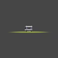 Silver Gray Caravan Parked on Green Grass with Open Door Windows and M Logo