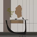 Elegant Modern Console Table With Glass Top Metal Legs Green Plant And Wall Sculpture