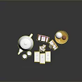 Household Items Collection Featuring White Teapot Cups Tea Bags And Eggs On Plate
