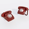 Two Vintage Red Dial Telephones With Classic Rotary Design On White Background
