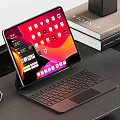 Modern Black Desk Setup With Laptop Lamp Headphones Books And Small Plant