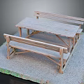 Wooden Outdoor Table With Attached Benches In Gravel Surface And Grass Edge Setting
