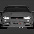Silver Modified Sports Car With Rear Spoiler And Sleek Exterior Design