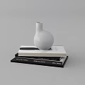 Stylish Decorative Ornament Set With White Vase On Stacked Books