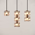 Three Modern Glass Cube Pendant Lights With Warm Light On Light Wall 3d model