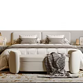 Double Bed with Beige Headboard Pillows Footstool Nightstands Table Lamp and Blanket