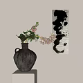 Gray Vase with Fresh Flowers on White Pedestal Against Beige Wall and Black White Abstract Painting
