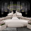 Elegant Banquet Hall With Crystal Chandelier Pink Floral Arrangements And White Stage
