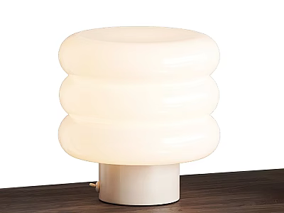 Modern Layered Cylindrical White Table Lamp with Soft Glow on Wooden Desk 3d model