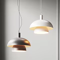 Two Modern Pendant Lights With Layered Dome Shades Textured Warm Light Interior