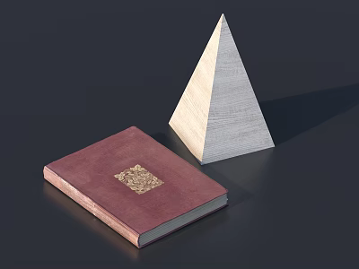Red Cover Book With Golden Design Next To White Pyramid On Dark Surface 3d model