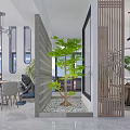 Modern Interior Space Featuring White Pillar Lattice Screen Green Plants Round Table And Laptop