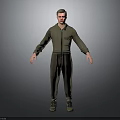 Man in Green Overalls Standing with Hands Naturally Hanging Down on Gray Background