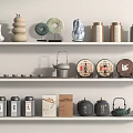 Traditional Chinese Tea Set Collection With Ceramic Teapots And Display Shelves