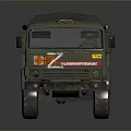 Military Green Truck With Canvas Covered Cargo Bed And Multiple Wheels